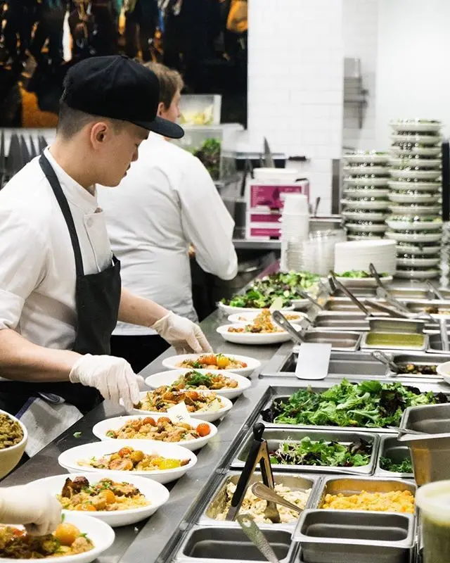 Tampa catering kitchen with chefs preparing gourmet meals