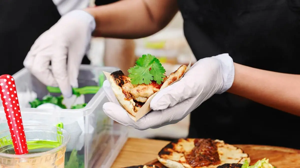 Food preparation training with focus on food safety, hygiene, protective equipment, and ServSafe certification – Tampa Caterers